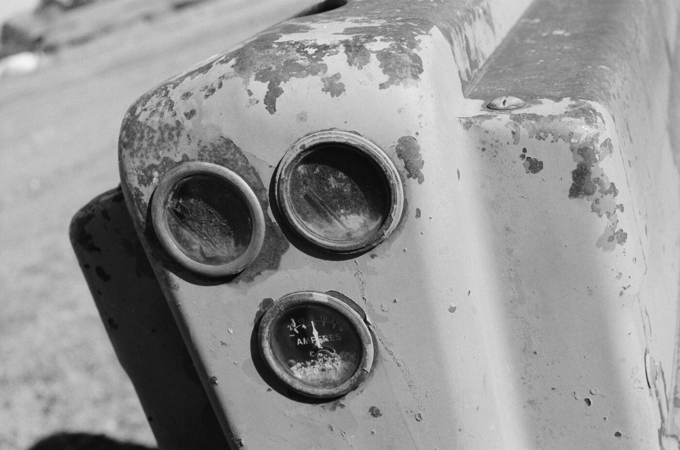 Weathered dashboard with rusted gauges